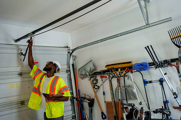 Professional Garage Door Panel Replacement technician working in Bellevue, MI